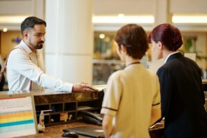 Man at hotel reception